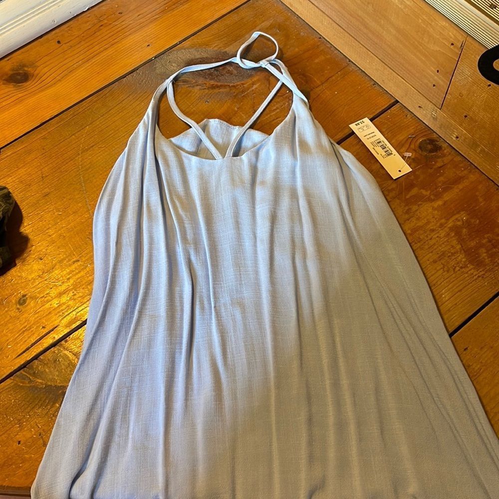 Swing style tank